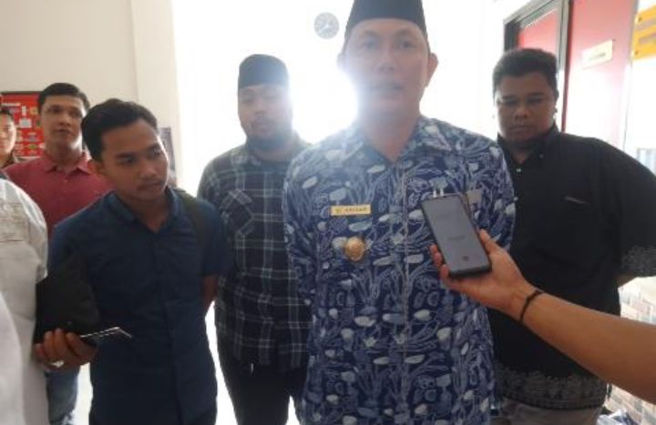 Kabag Hukum Turun Gunung, Dampingi Wabup Tanjabbar Penuhi Panggilan Penyidik Terkait Akun Medsos Ujaran Kebencian